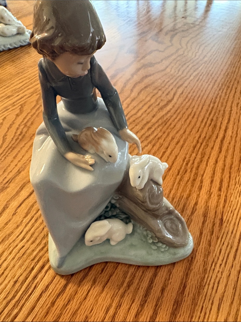 Porcelain Girl Figurine with Bunnies - Gray and White Accent